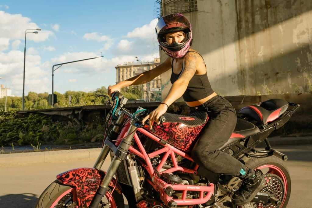 Stylish woman sitting on a motorcycle, symbolizing confidence, independence, and empowerment