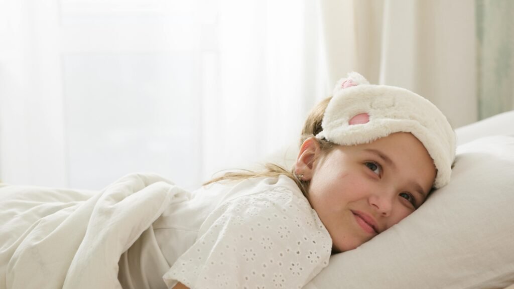 Child starting the day with a cheerful morning smile in comfortable bedroom